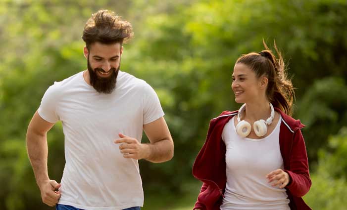 Couple running in a park